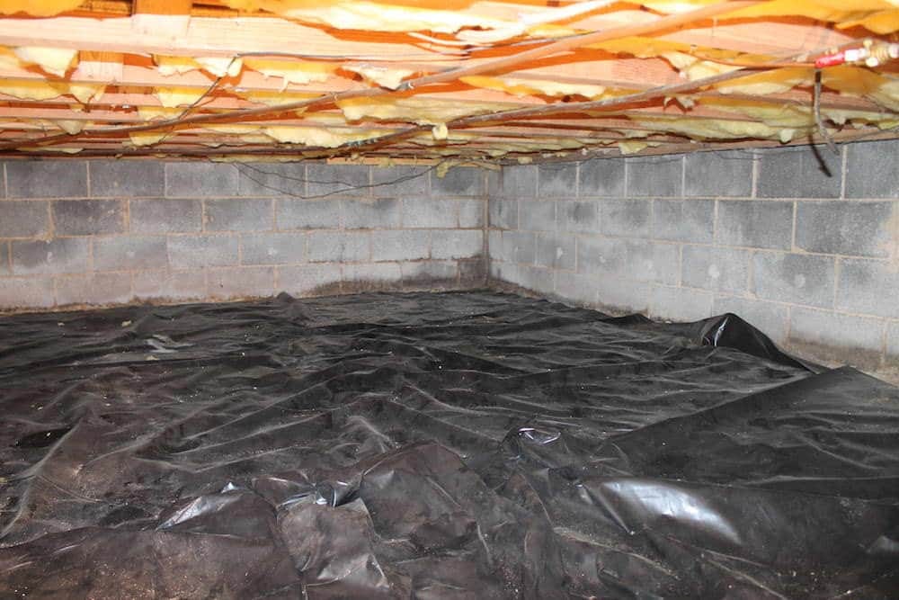 Vapor Barrier Installation to Restore Clean and Dry Crawl Spaces